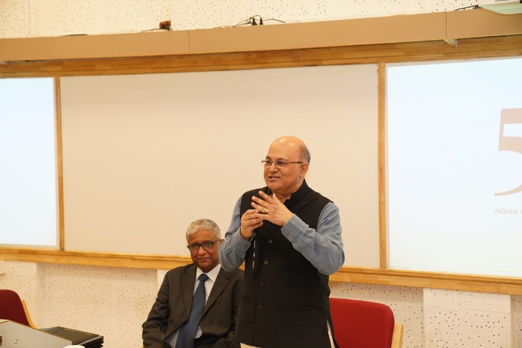 The Director of IIMB, Prof. Rishikesha Krishnan congratulating the participants during the valedictory event