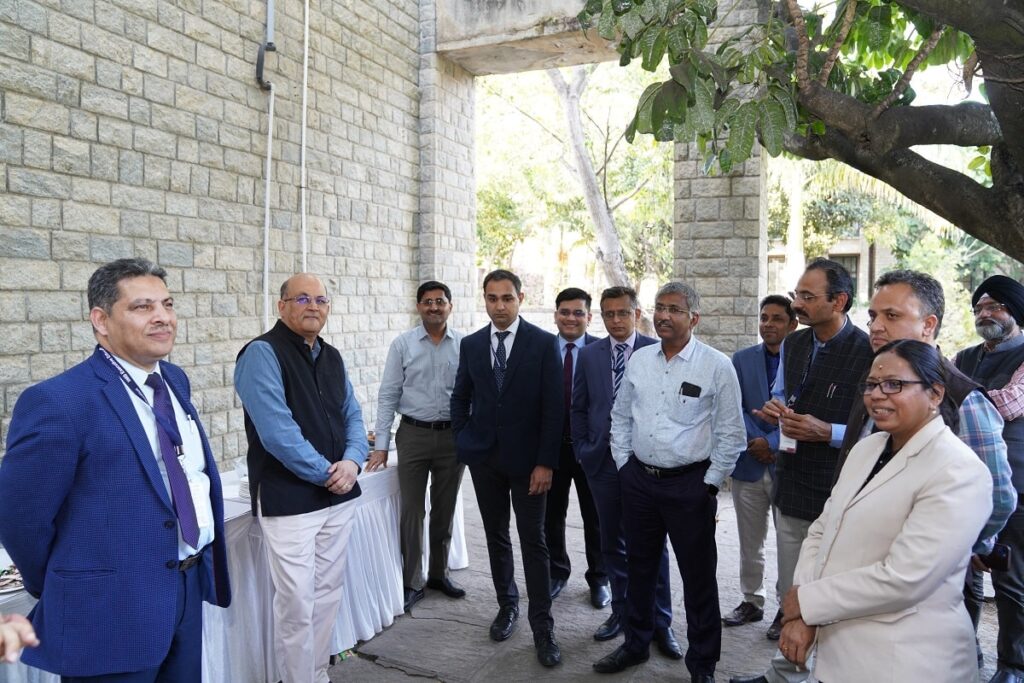 The director of IIMB meeting the participants during a coffee break